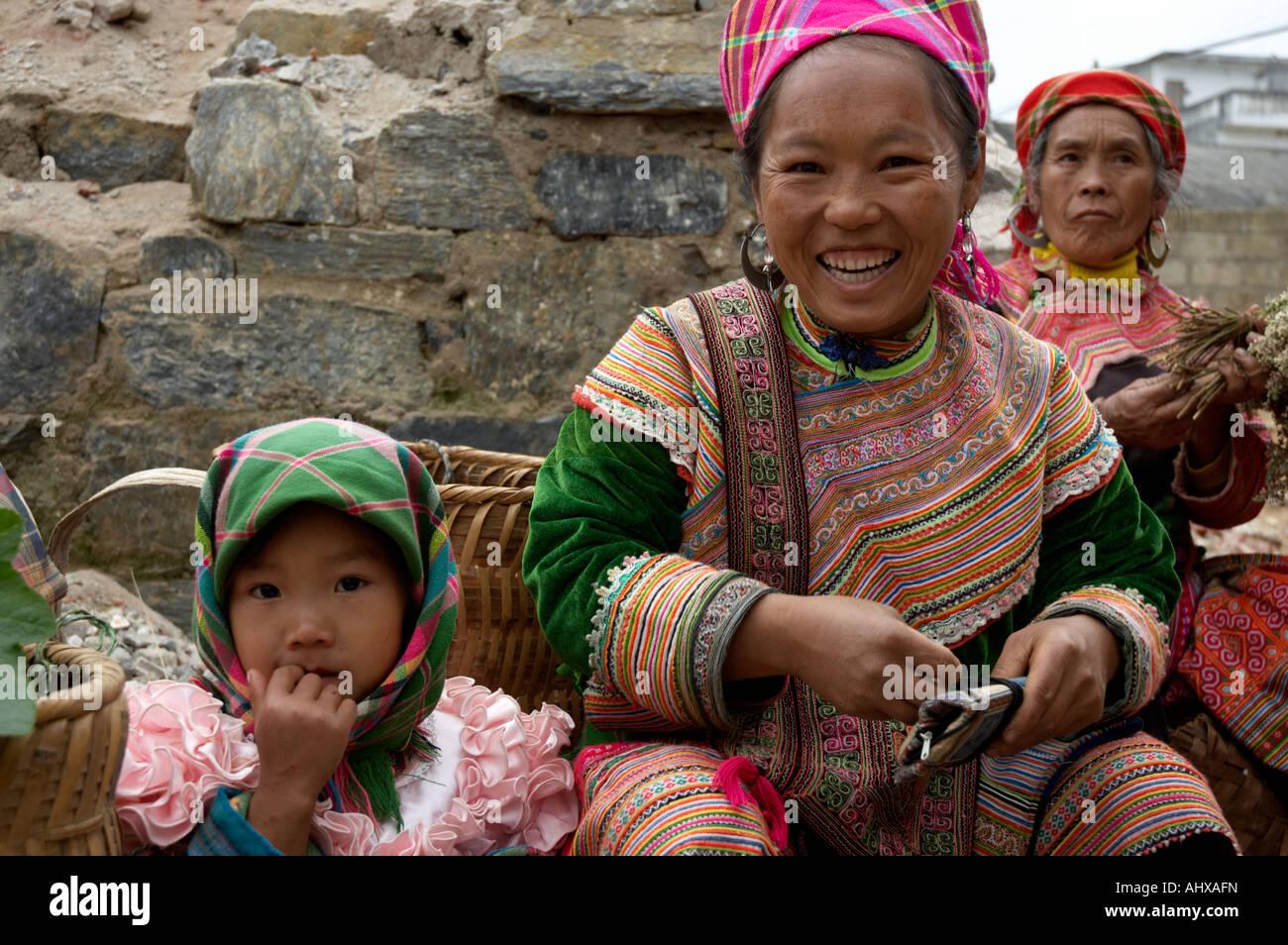 Women from the Flower Hmong Hill Trlbe, Can Cau Market, near Sapa, Vietnam Stock Photo