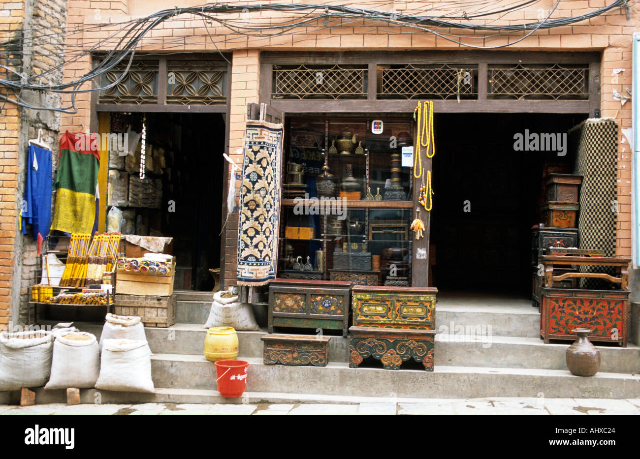 Tibetan Shop With Incense And Furniture In Front Of Boudhanath