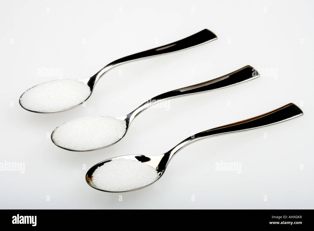 Spoons of Sugar Stock Photo Alamy