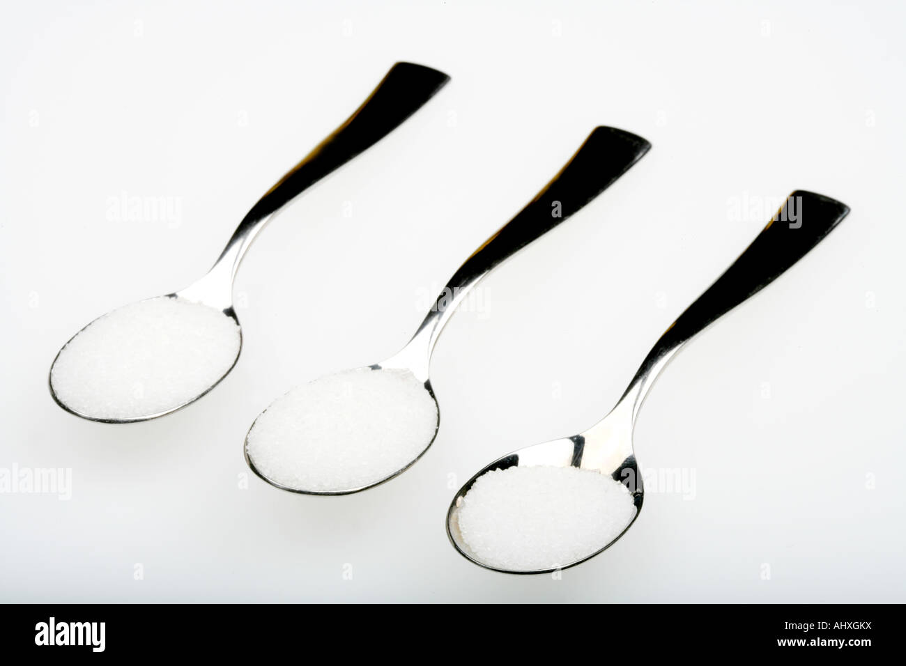 Spoons of Sugar Stock Photo Alamy