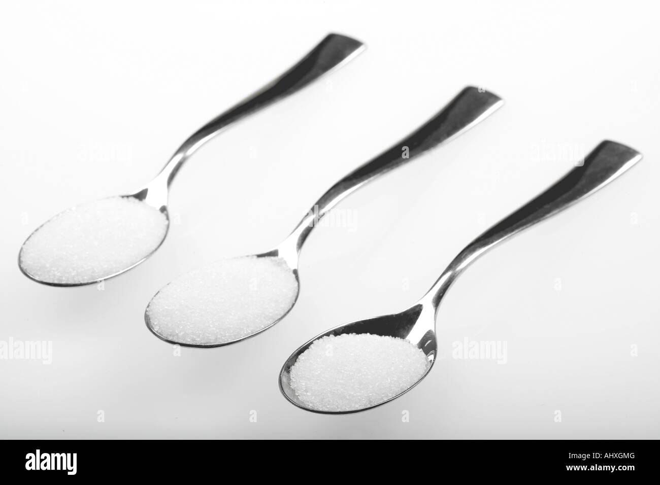 Spoons of Sugar Stock Photo