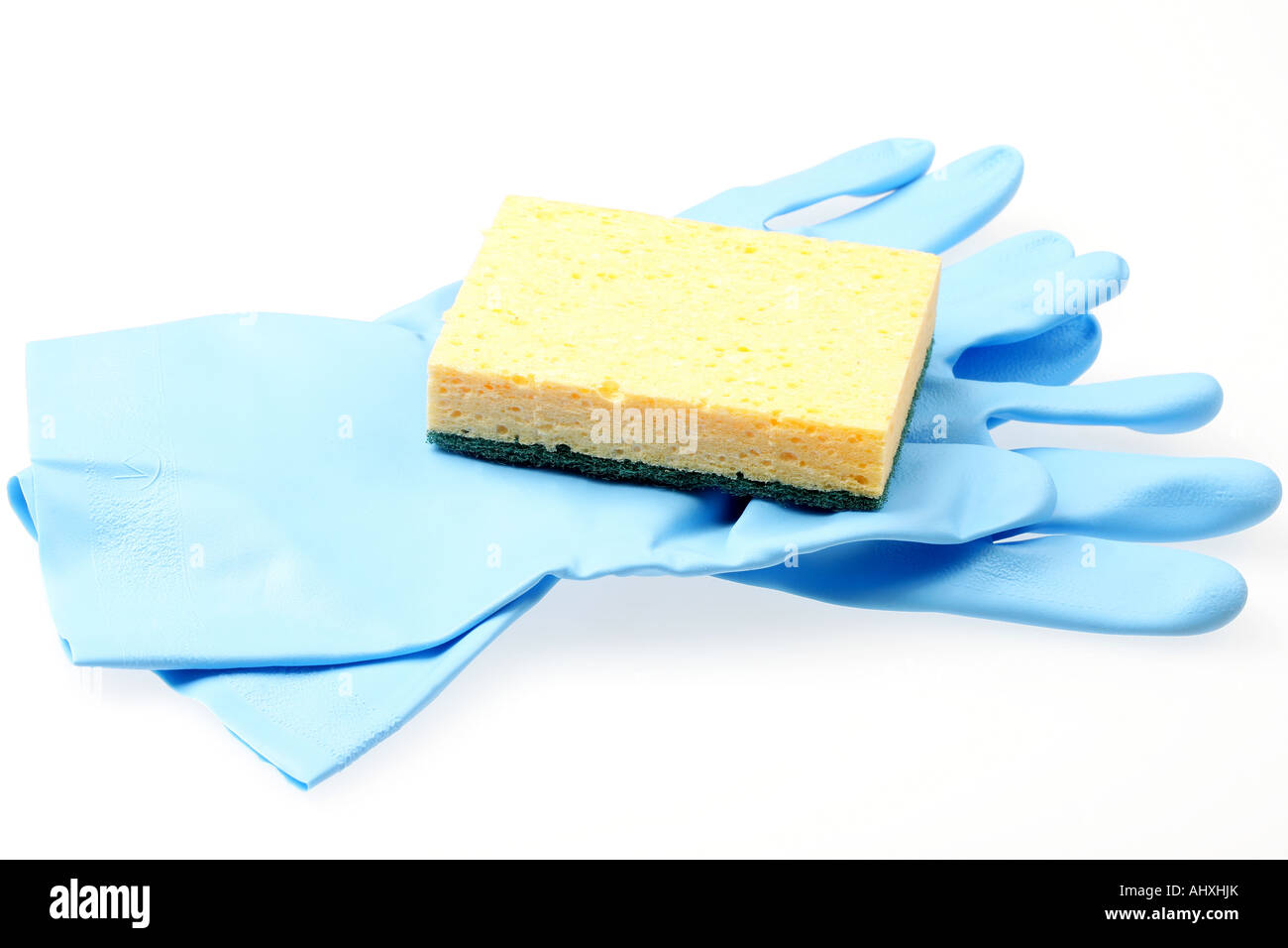 Personal Protective Rubber Gloves And An Abrasive Scouring Pad To Clean