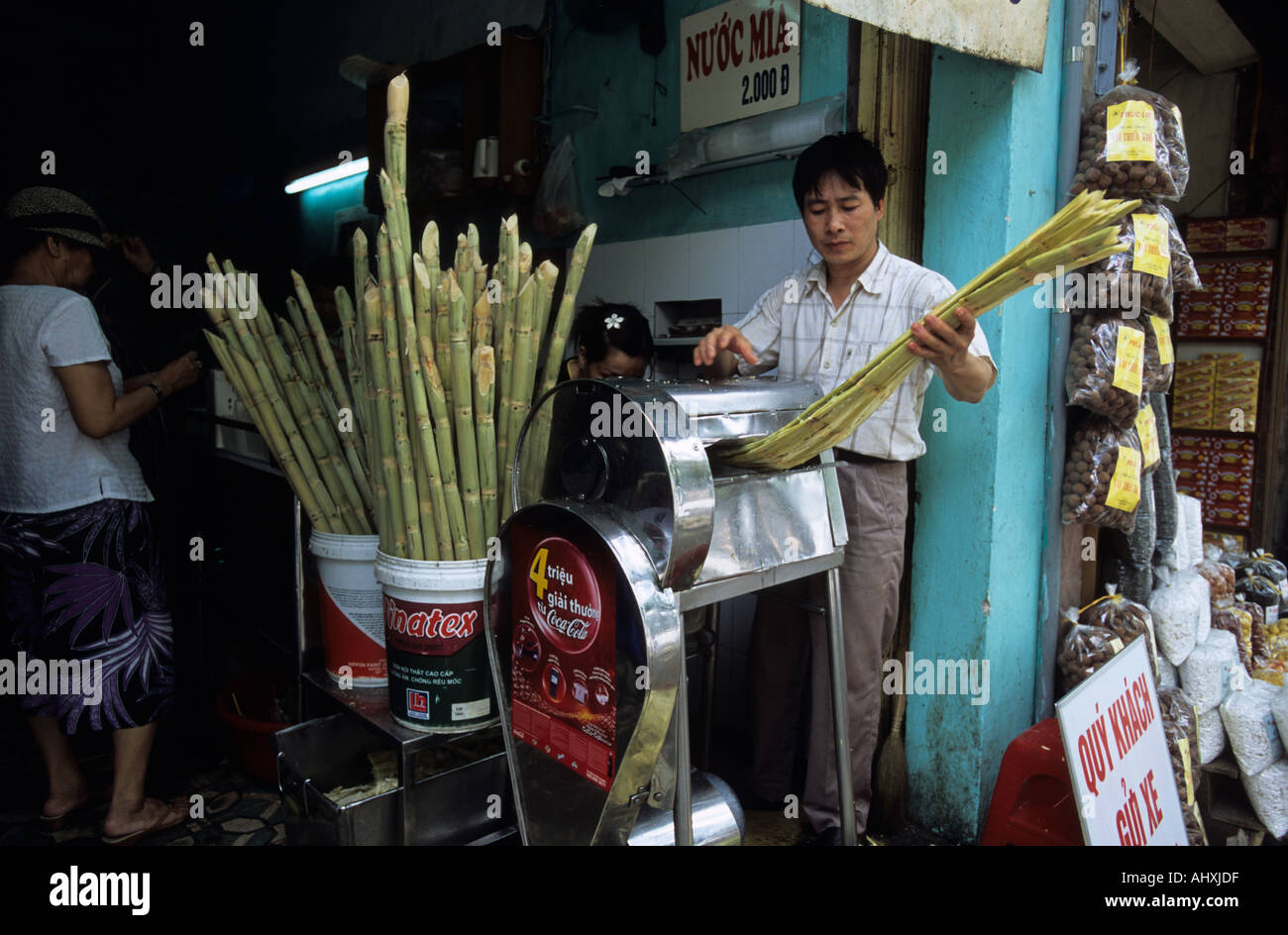 Vietnam Hanoi making sugar cane juice Stock Photo Alamy