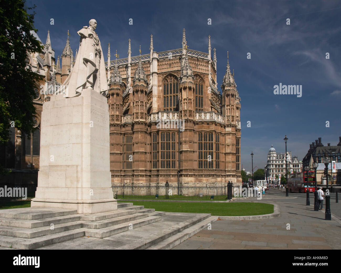 Statue of King V outside Westminster Abbey London Stock Photo