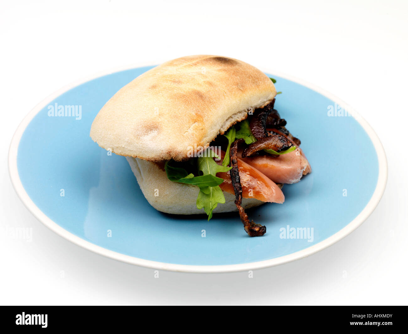 Grilled sausage in ciabatta bread roll caramelised red onion lunch hi