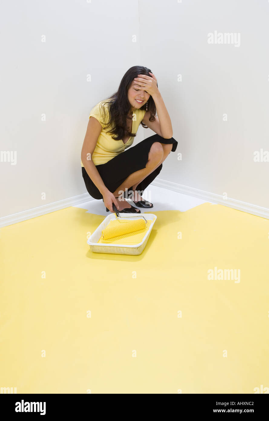 Woman painted into a corner Stock Photo Alamy