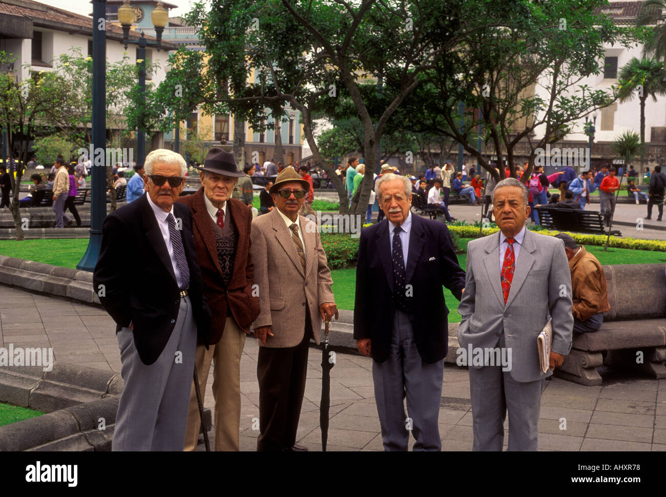 5, five, Ecuadorans, Ecuadoran, adult men, public square, Plaza de la Independencia, Independence Square, Quito, Pichincha Province, Ecuador Stock Photo