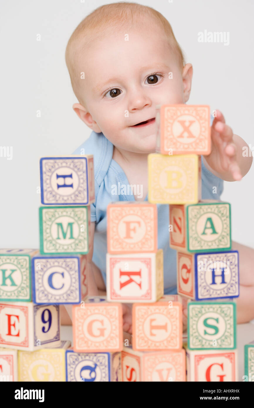 Baby playing with blocks Stock Photo Alamy