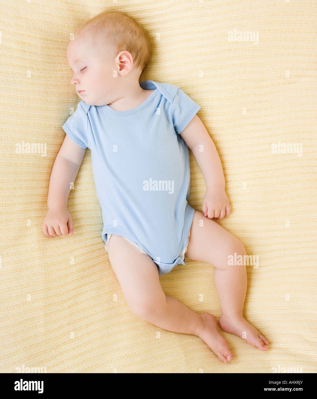 Baby sleeping on bed Stock Photo Alamy