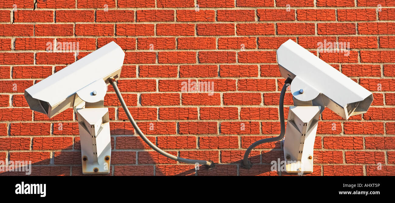Security cameras on brick wall Stock Photo Alamy