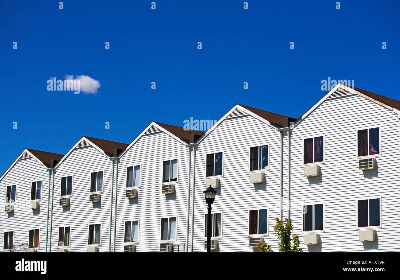 Row houses under blue sky Stock Photo - Alamy