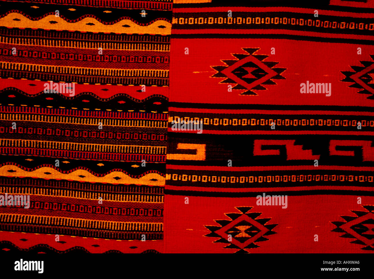 vendor seller selling textiles rug rugs carpet carpets at Saturday