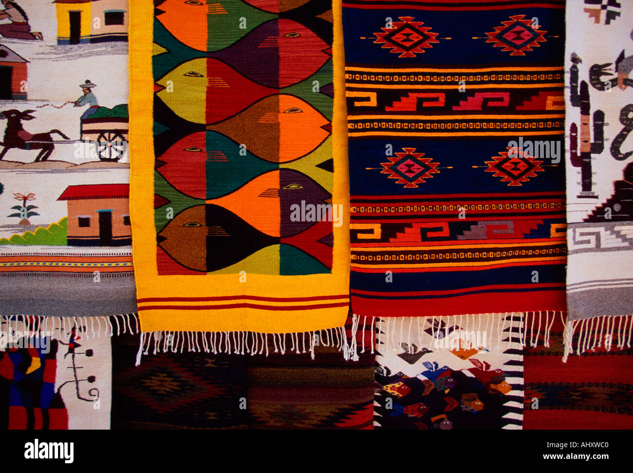 vendor seller selling textiles rug rugs carpet carpets at Saturday