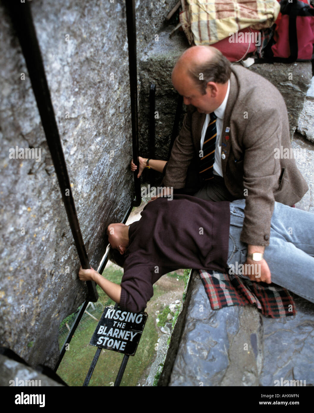 woman kissing the blarney stone, the gift of the gab is given to those who  kiss the famous blarney stone Stock Photo - Alamy