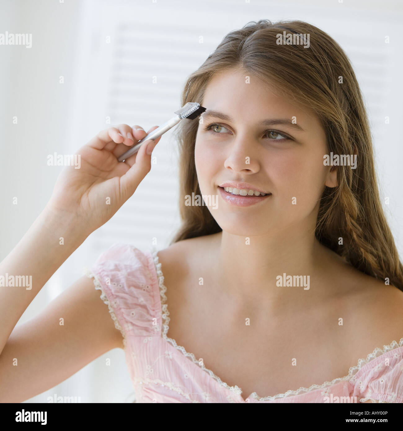 Portrait of girl wearing off shoulder blouse Stock Photo