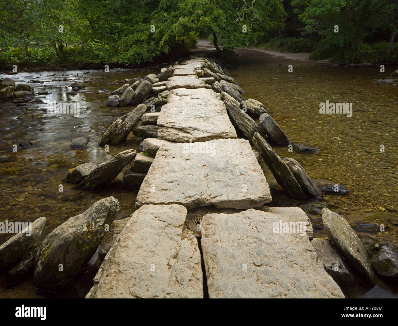 Tarr Steps ancient clapper bridge over river Barle Exmoor Somerset UK Stock Photo