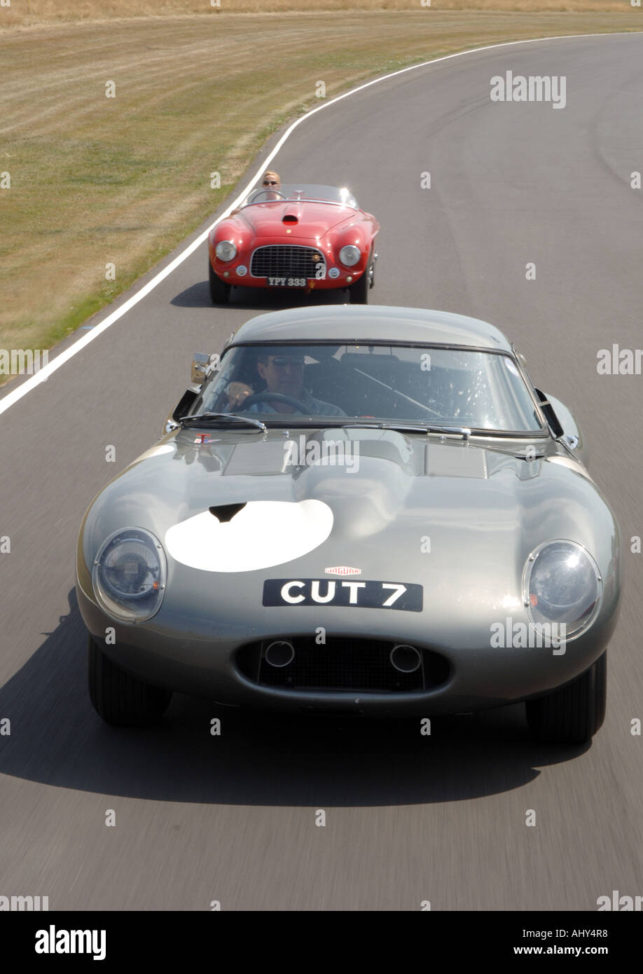 Ferrari and Jaguar E Type lightweight at Goodwood Revival, England 2006 Stock Photo