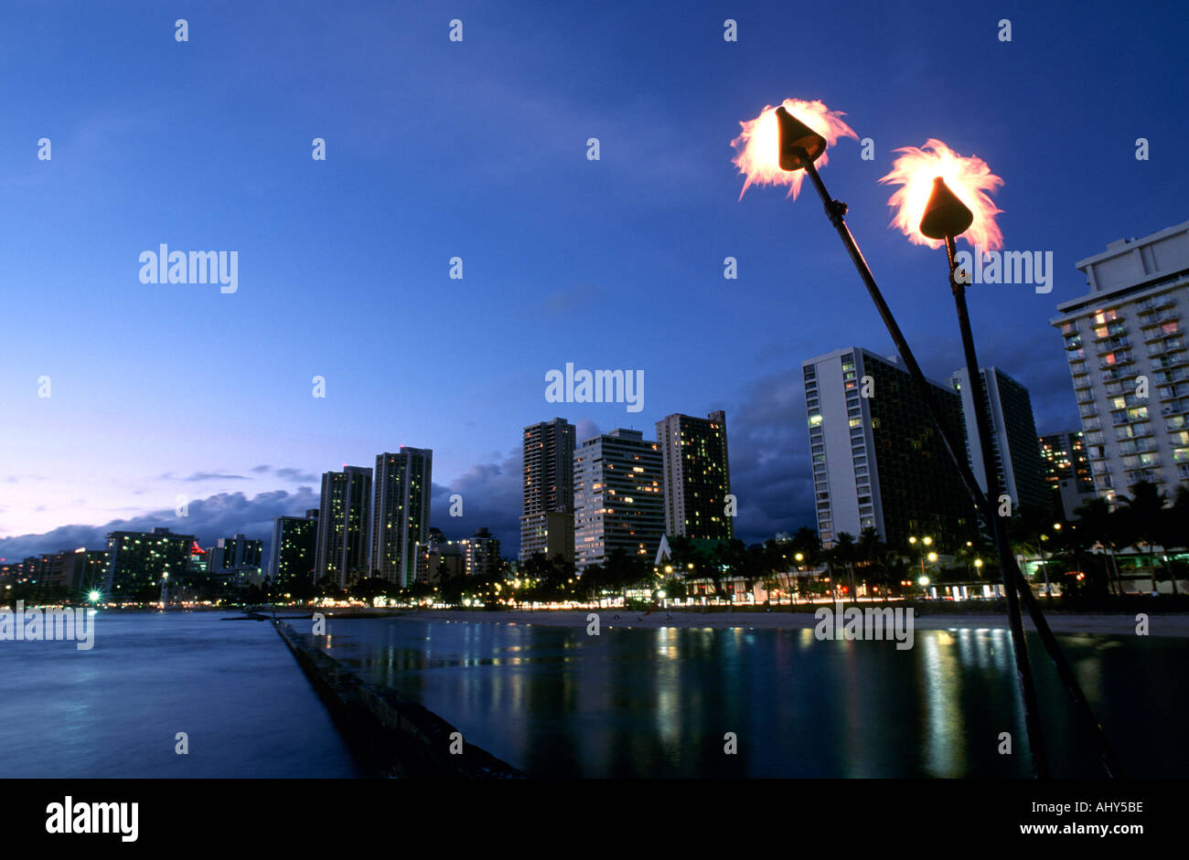 Waikiki Beach and skyline at sunset Honolulu Hawaii Stock Photo - Alamy