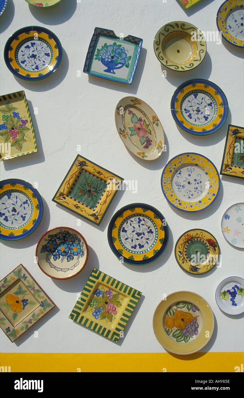 Traditional typical portuguese pottery plates on wall of pottery