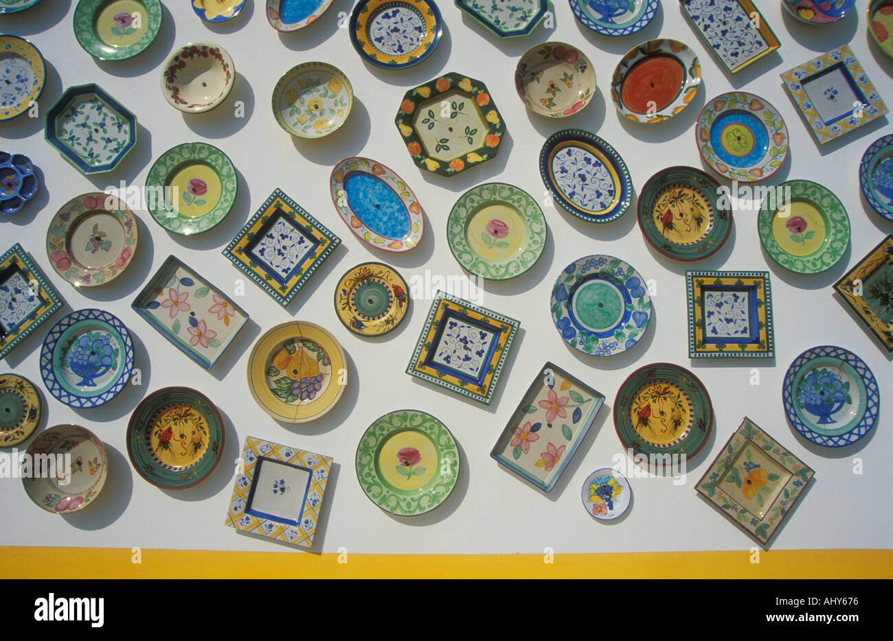 Traditional typical portuguese pottery plates on wall of pottery Sagres Algarve
