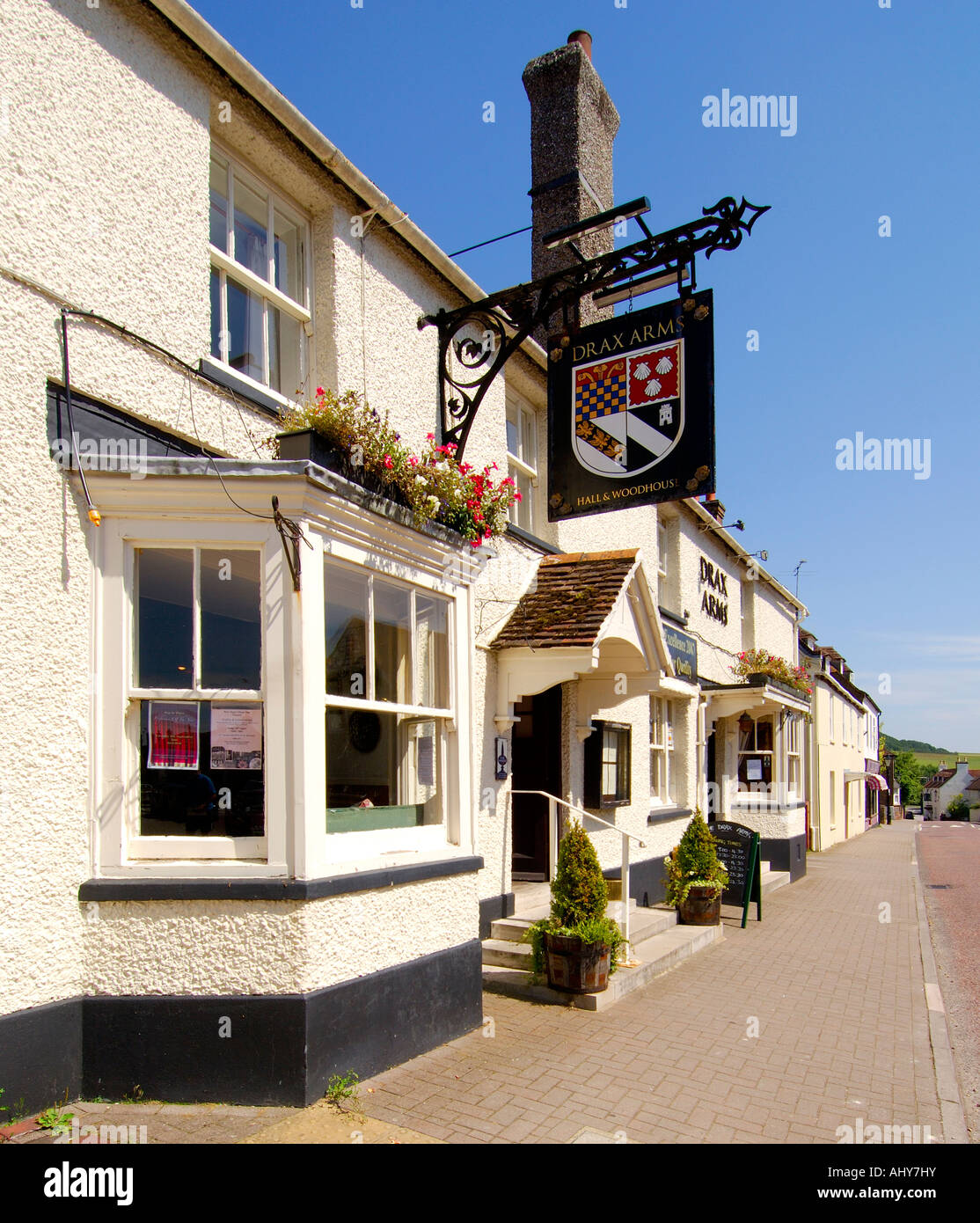 The Drax Arms public house in Bere Regis Dorset on a bright sunny