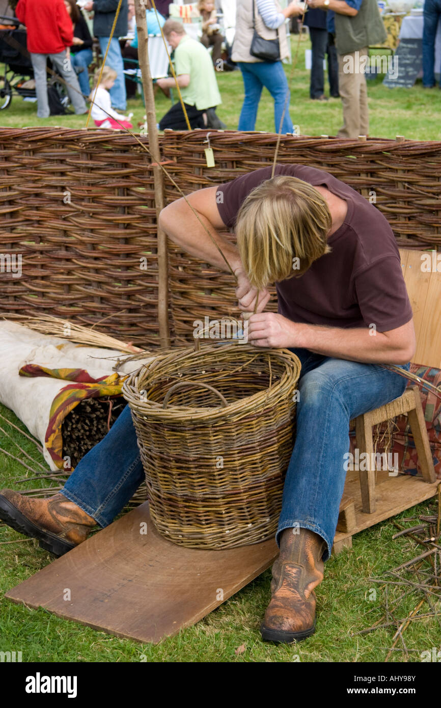Young man making a basket Stock Photo