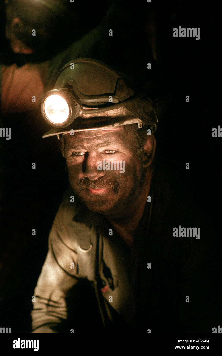 underground coal mining Miner on the coal face undergound at Tower Colliery deep coal mine Hirwaun South Wales UK Stock Photo