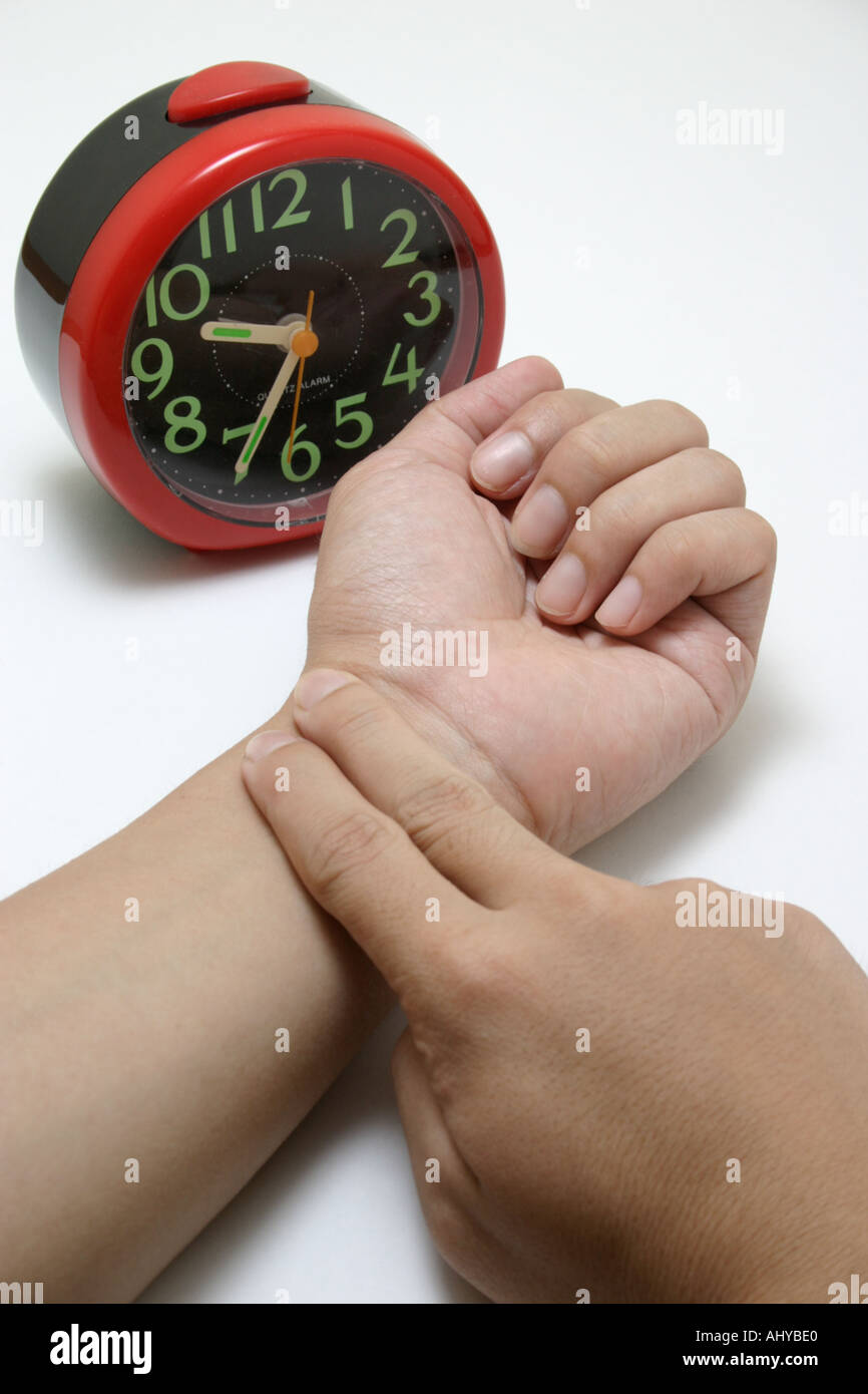 Taking pulse hi-res stock photography and images - Alamy