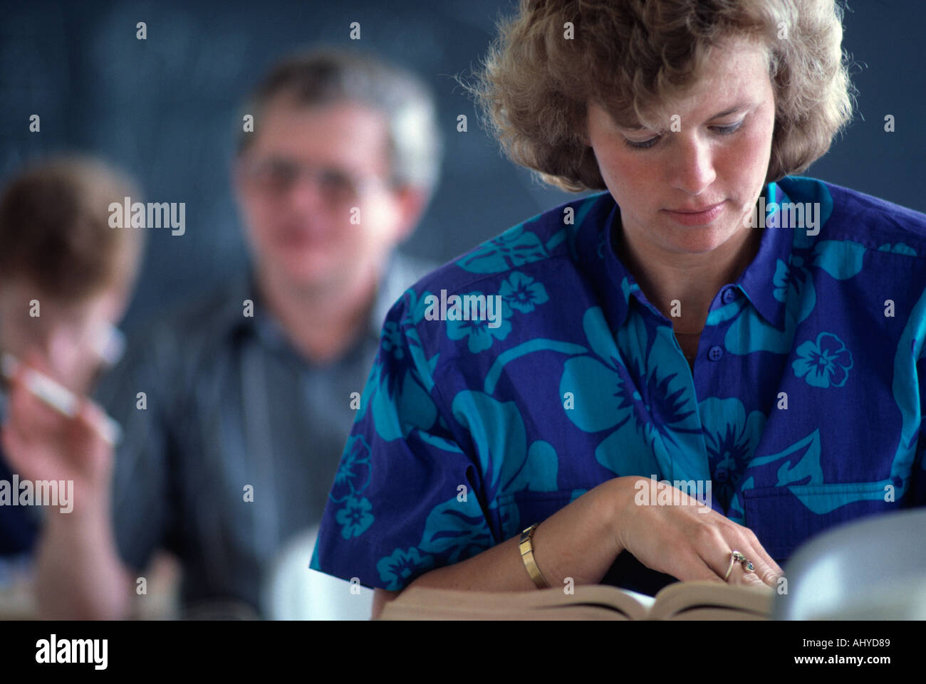 Caucasian woman studying in adult education class Stock Photo