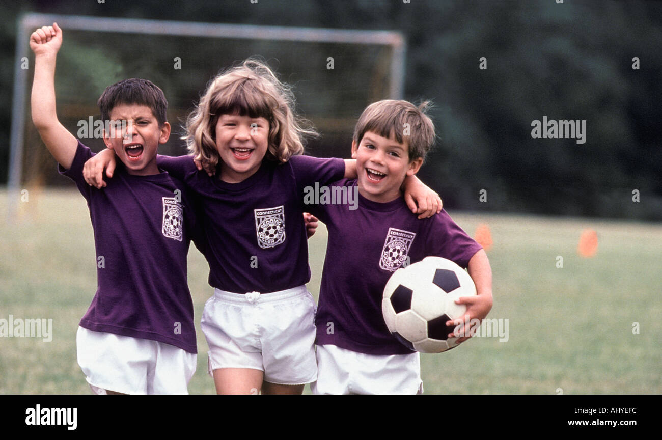 Portrait of a happy youth football player Stock Photo - Alamy