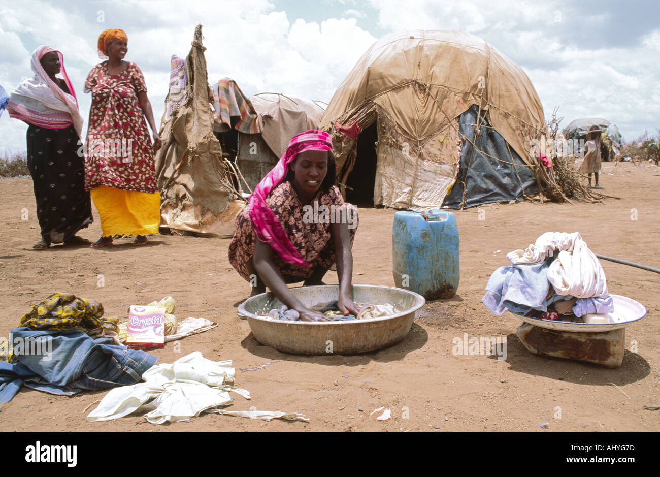 Somali refugee woman washing clothes in a refugee camp. Ethiopia Stock Photo