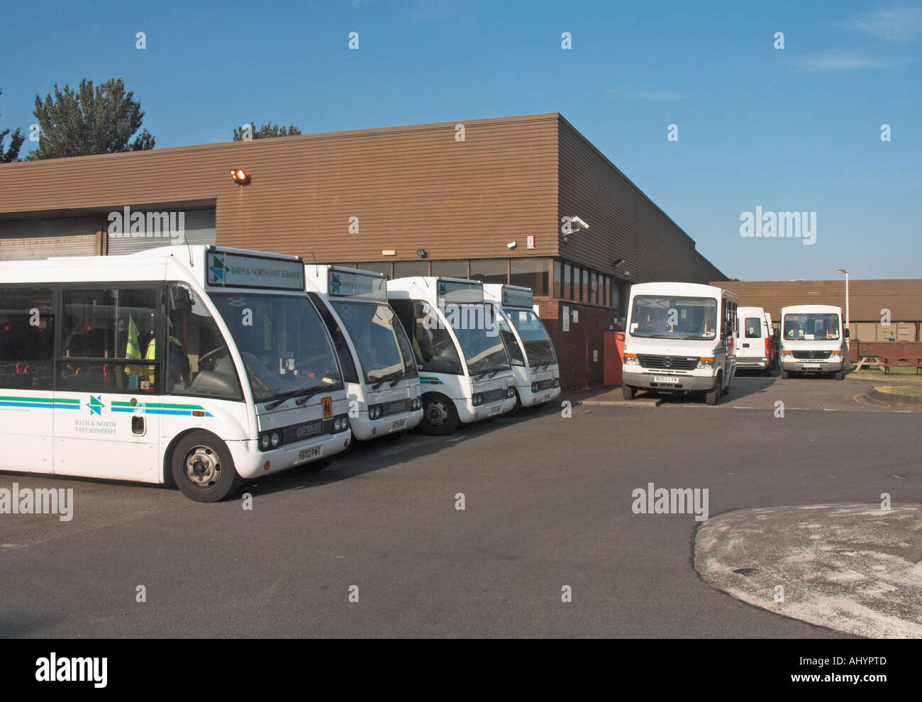 Fleet of school buses in car park Bath and North East Somerset England