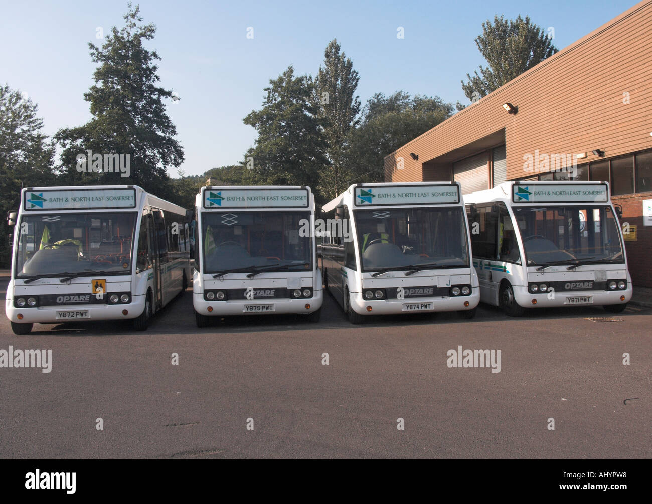 Fleet of school buses in car park Bath and North East Somerset England