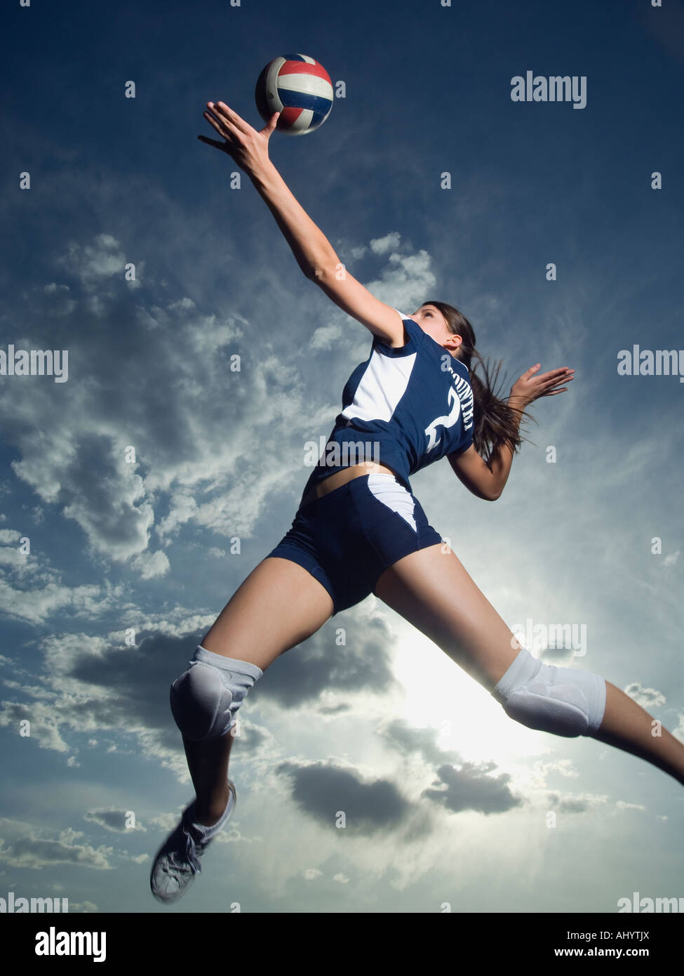 Low angle view of volleyball player jumping Stock Photo Alamy