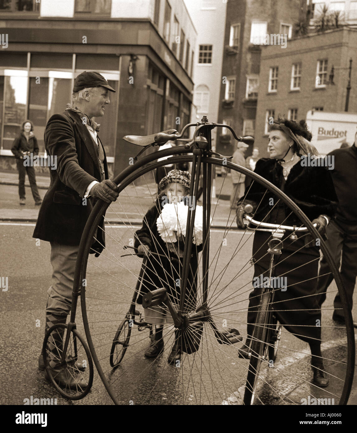 Participants dressed as Edwardian and Victorian cyclists in London New Years Day Parade Stock Photo
