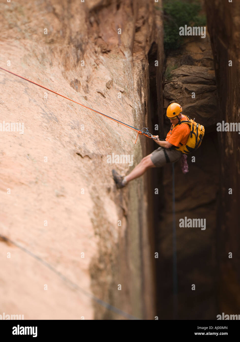Climbing top cliff angle hi-res stock photography and images - Alamy