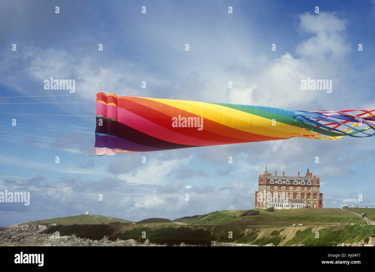 Kite flying over Fistral beach and the Headland Hotel at Newquay on the north coast of Cornwall, UK Stock Photo