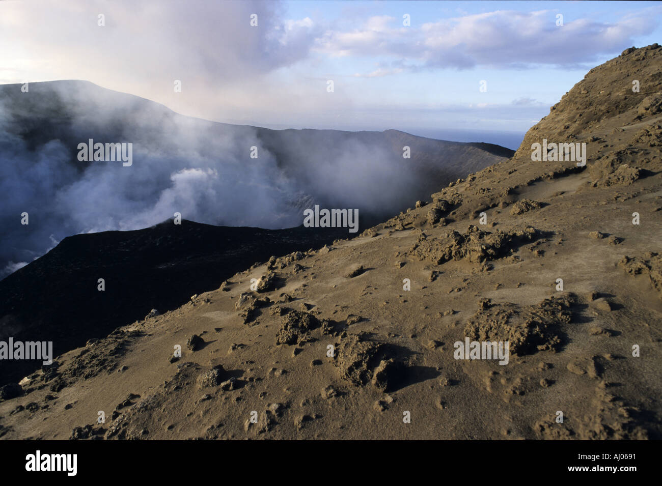 Smoke billowing from the crater of Yasur Volcano, Tanna Island, Vanuatu. Stock Photo