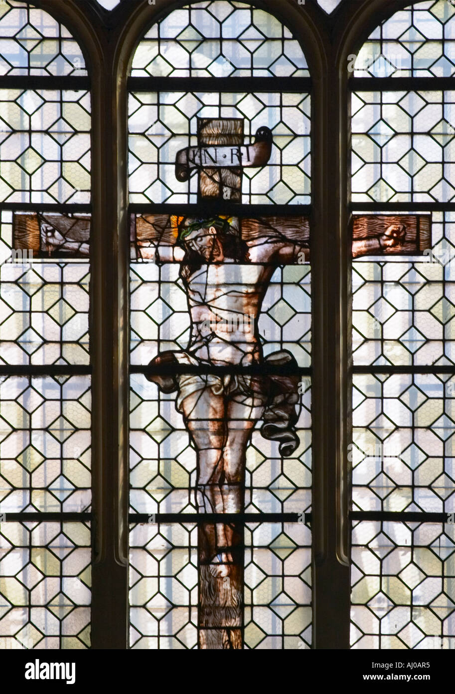 Stained glass window of Christ on the crucifix in St Etienne du Mont