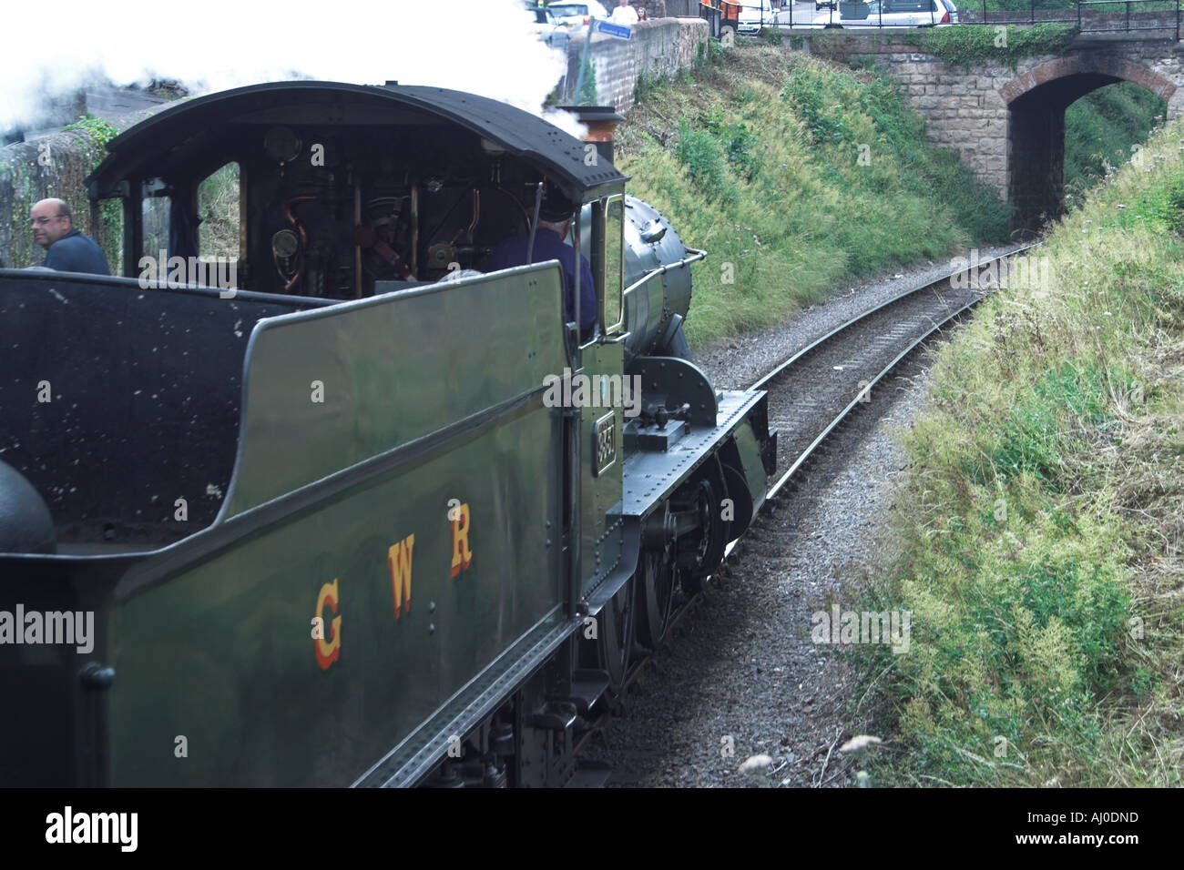 Steam train leaving Watchet station heading towards Minehead. Somerset Steam Railway. Somerset. England Stock Photo