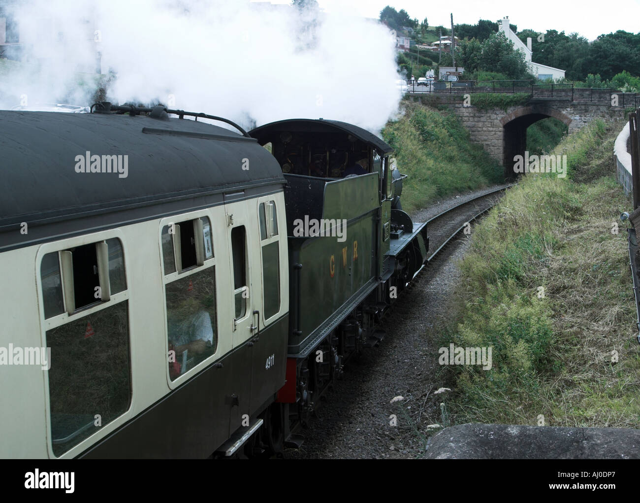 Steam train leaving Watchet station heading towards Minehead. Somerset Steam Railway. Somerset. England Stock Photo
