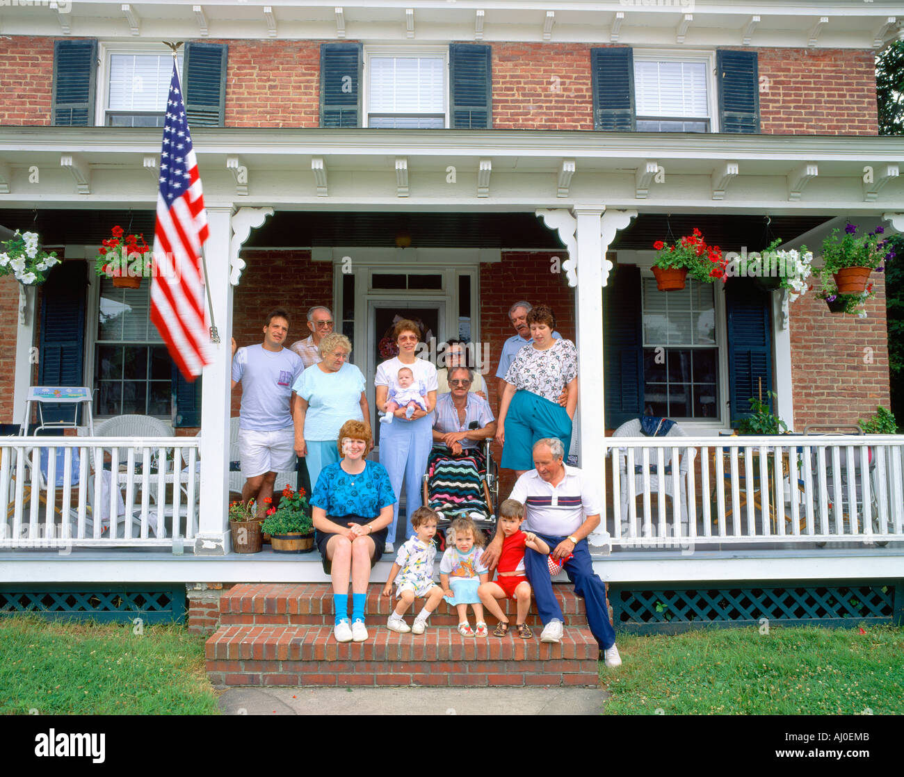 Family on porch Rock Hall E Shore Maryland Stock Photo