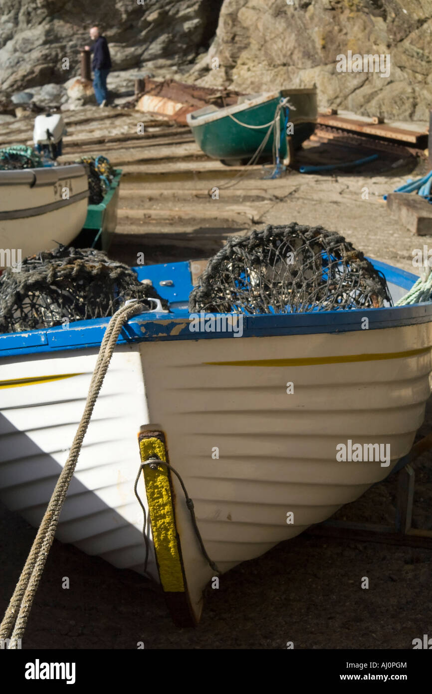 Dinghies on a concrete launching ramp Stock Photo Alamy
