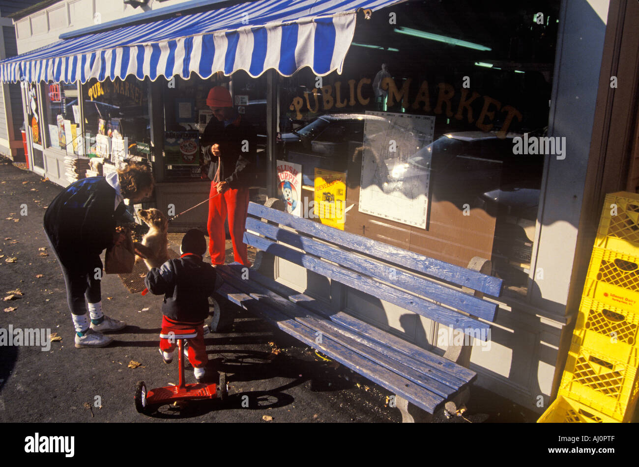 Mother and child at exterior of Public Market West Stockbridge MA Stock
