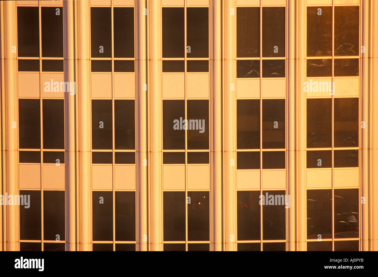 Sunset in windows of office building Stock Photo - Alamy