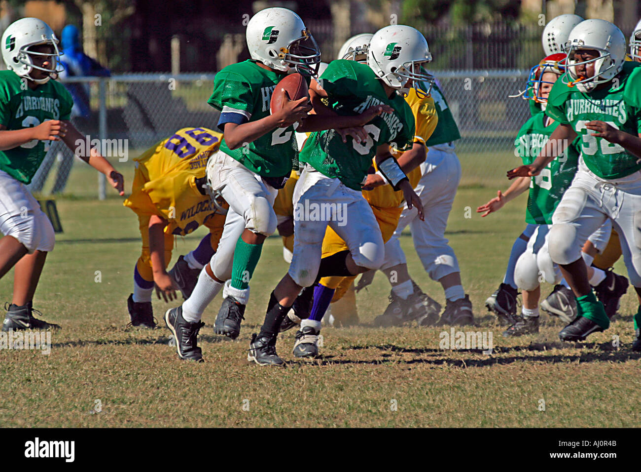 Youth Football in Action Play Blocking and Tackling American Football