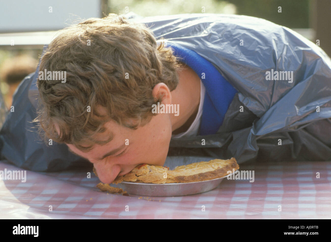 Pie eating contest hires stock photography and images Alamy