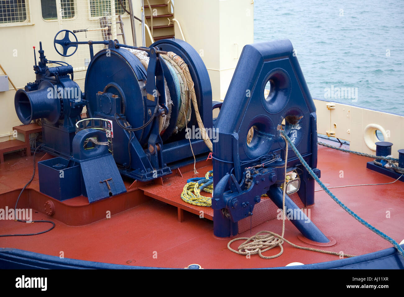 Power winch and fairlead on tug boat stern in dock Stock Photo Alamy