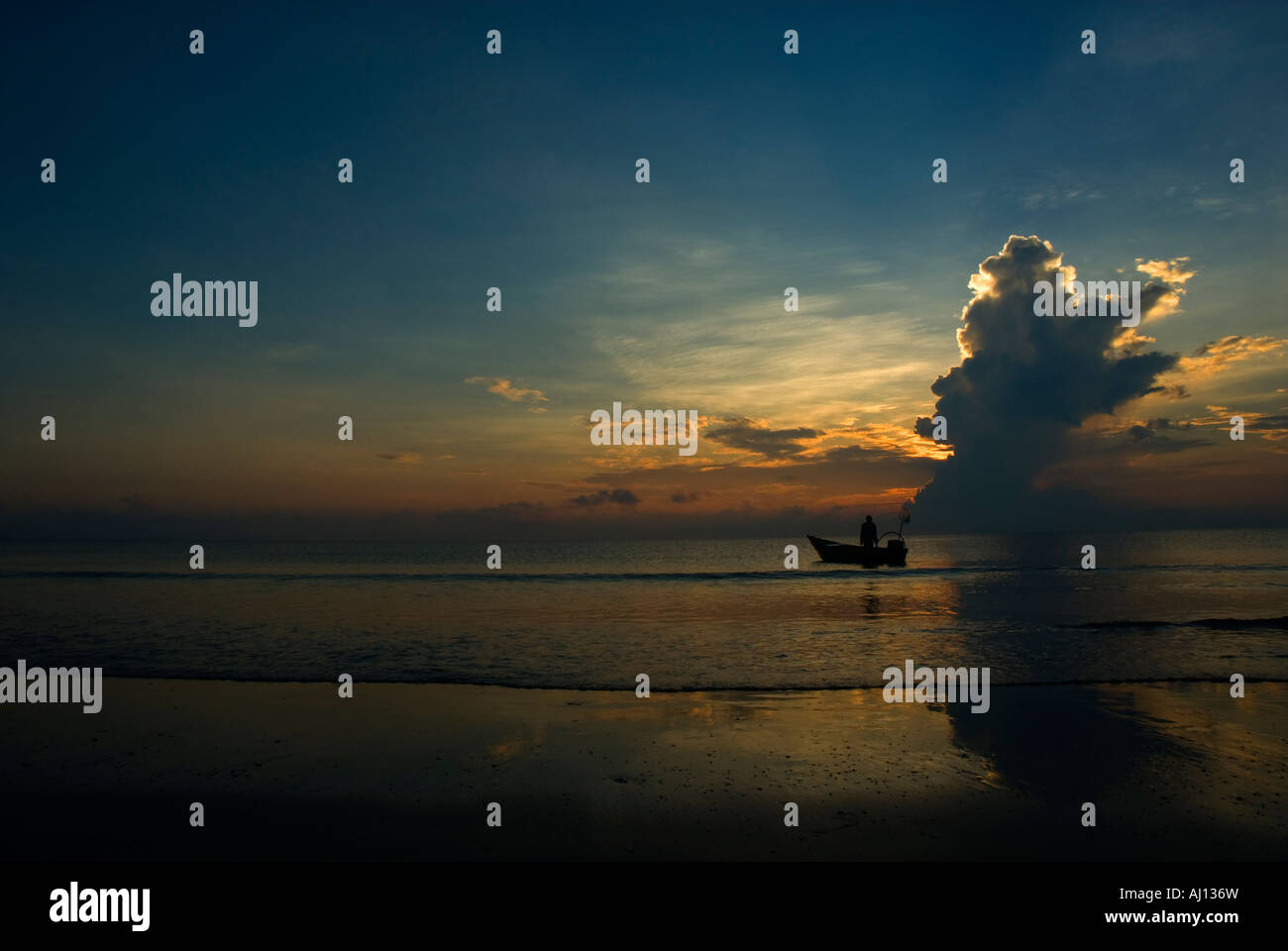 Silhouette of a fisherman Stock Photo - Alamy