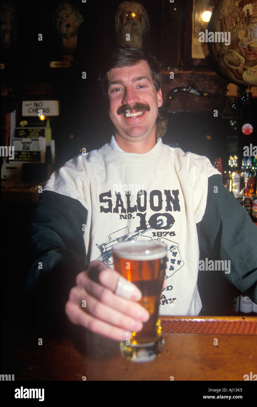 A bartender at an old style saloon Deadwood SD Stock Photo
